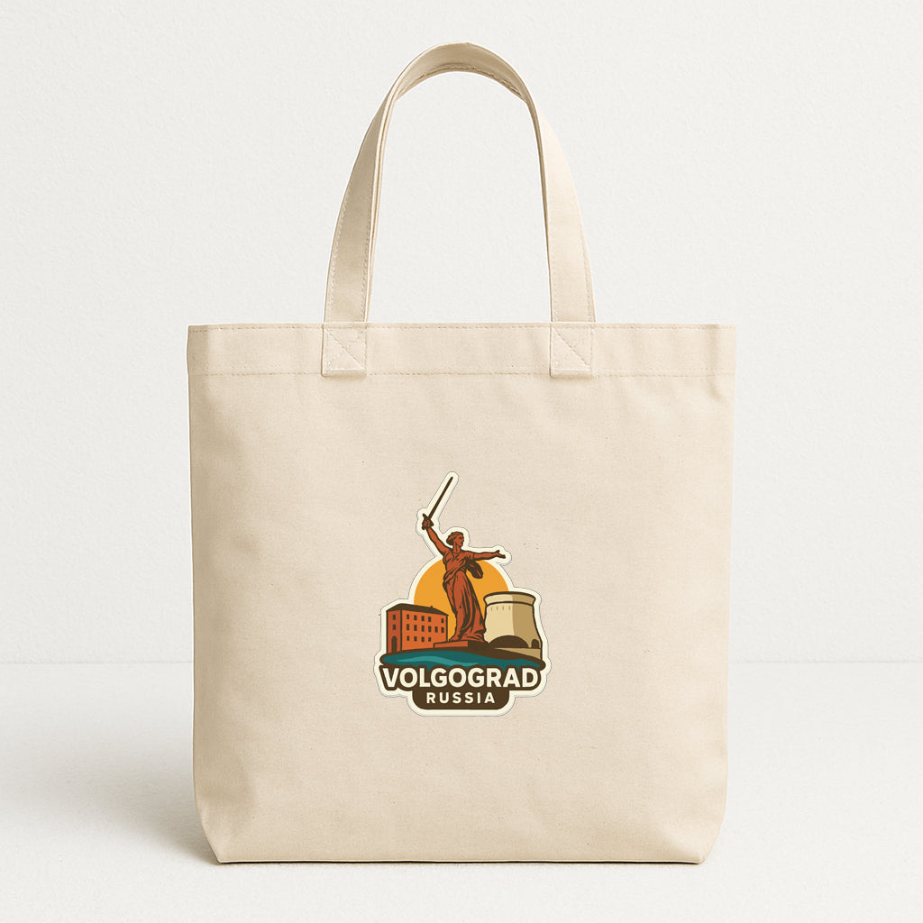 A beige tote bag with a printed logo that says "VOLGOGRAD RUSSIA".