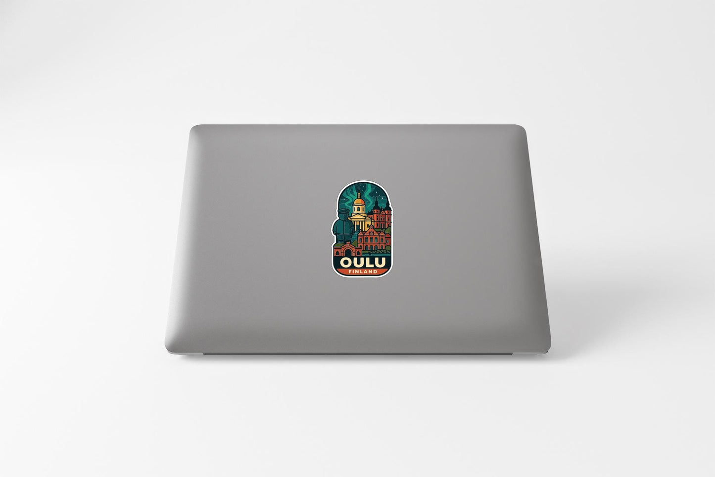 a laptop with a sticker of a man on it
