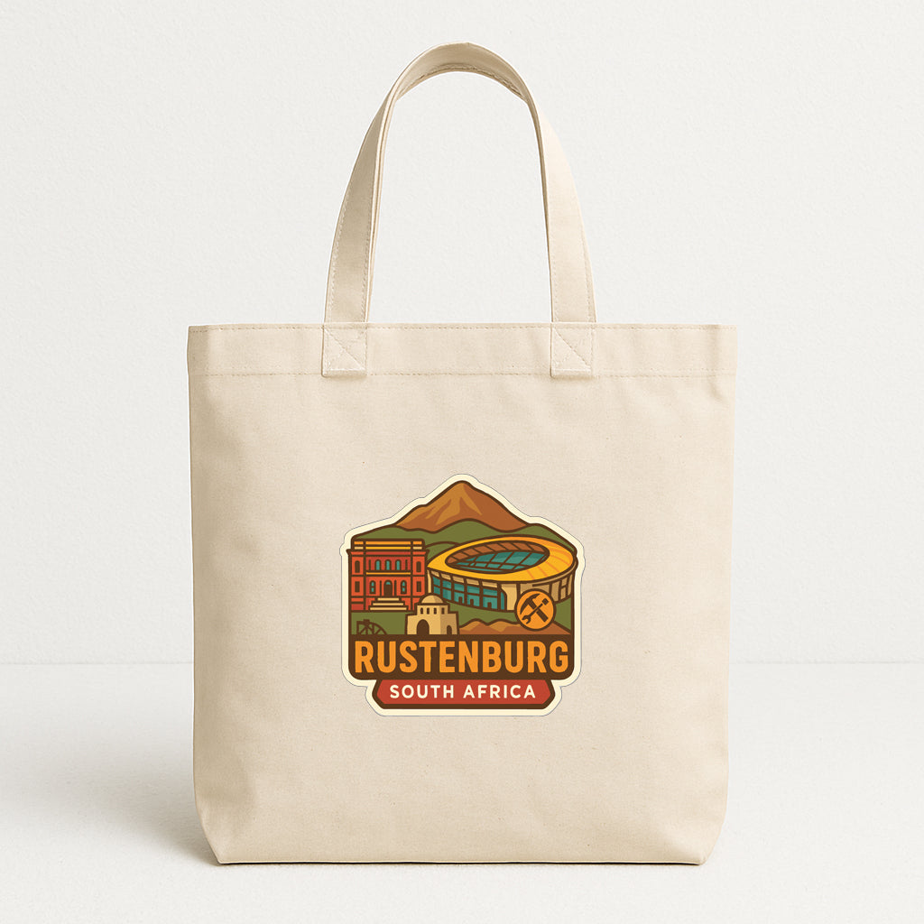 A beige tote bag with a printed design depicting a landmark, specifically Rustenburg, South Africa.