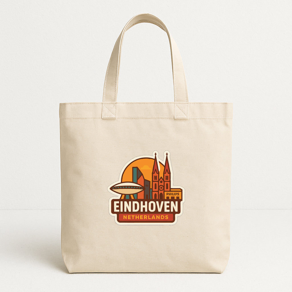 A beige tote bag with a graphic design featuring the city of Eindhoven, Netherlands.