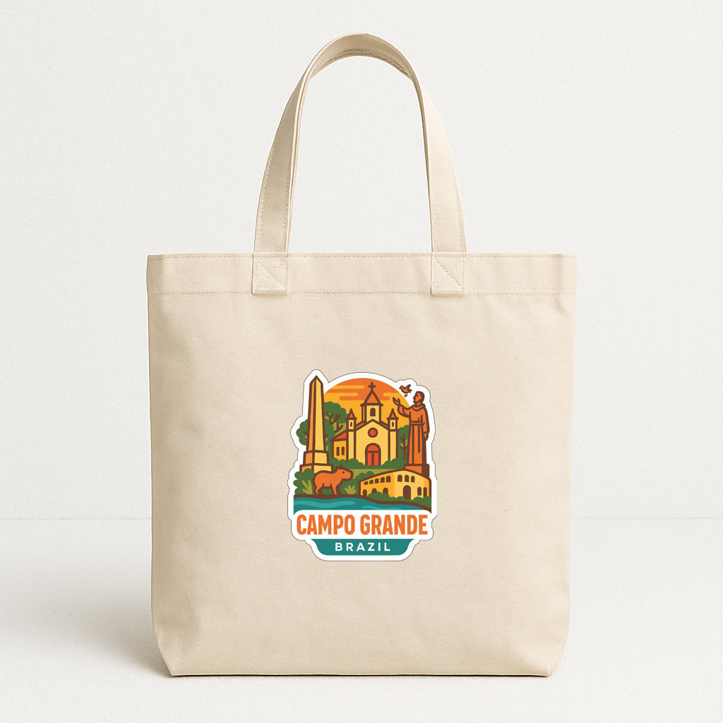 A beige tote bag with a printed design depicting the city of Campo Grande, Brazil.
