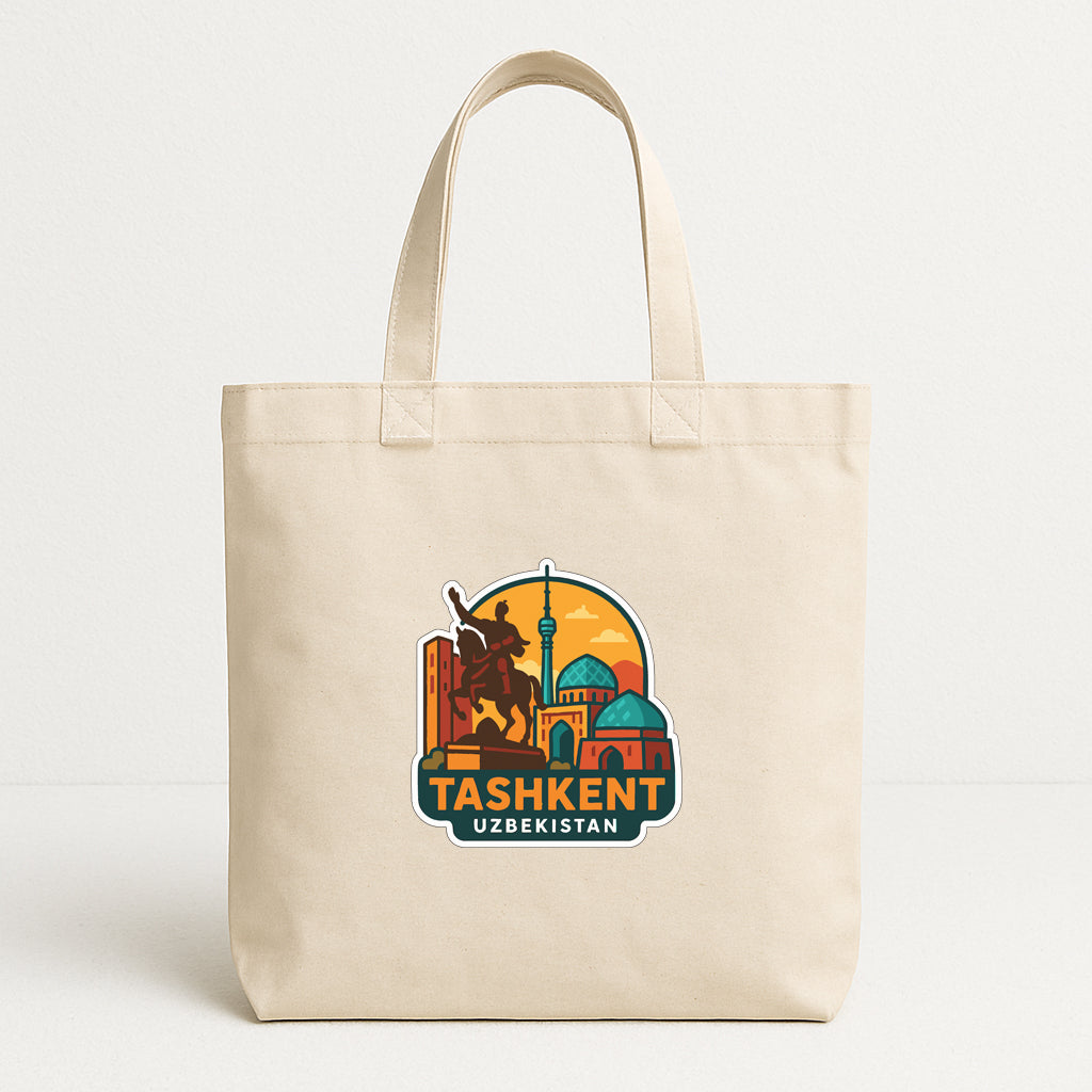 A beige tote bag with a graphic design featuring a monument and the text "Tashkent Uzbekistan" printed on it.