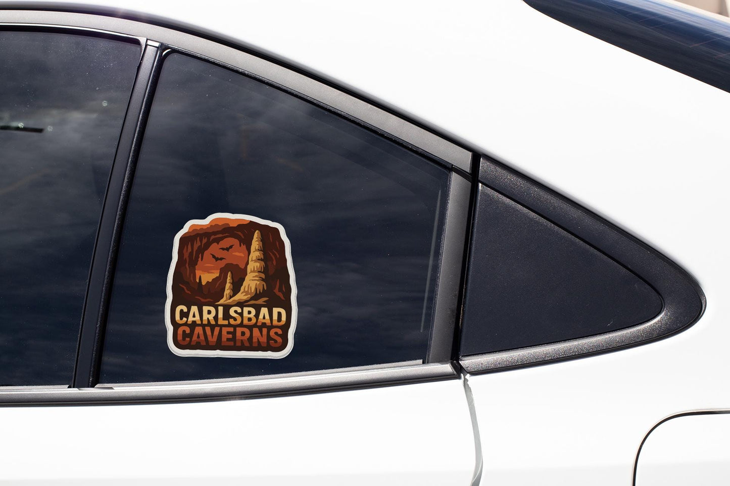 A car window sticker with the text "CARLSBAD CAVENS" is visible on the side of the vehicle.