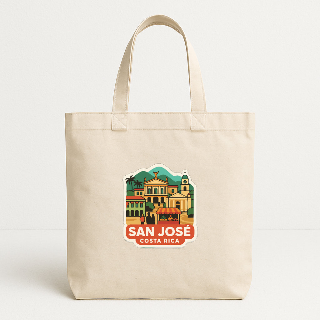 A beige tote bag with a printed design depicting a cityscape and the text "SAN JOSE, COSTA RICA" printed on it.