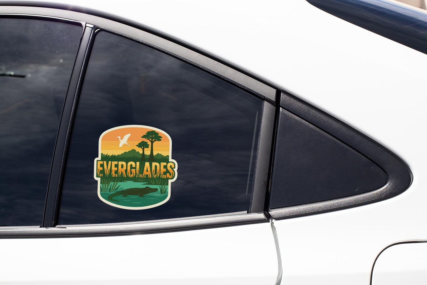 A sticker on the side of a car window that says "EVERGLADES".