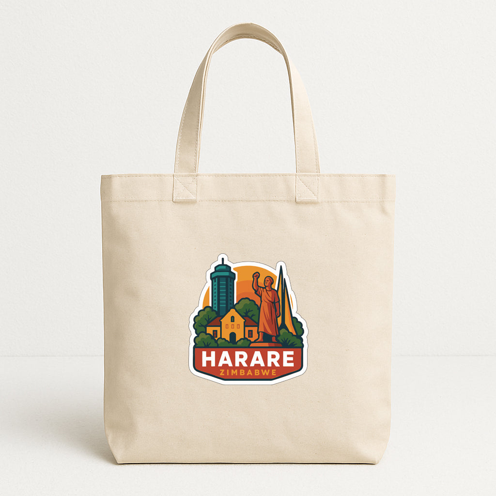 A beige tote bag with a graphic design featuring a city skyline and a statue, along with the text "HARARE ZIMBABWE".