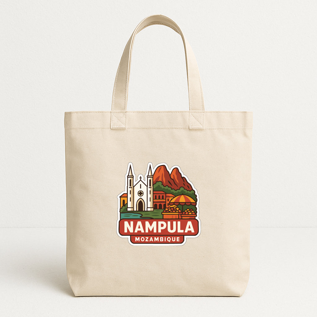 A beige tote bag with a printed design of landmarks and a red banner that says "NAMPULA MOZAMBIQUE".
