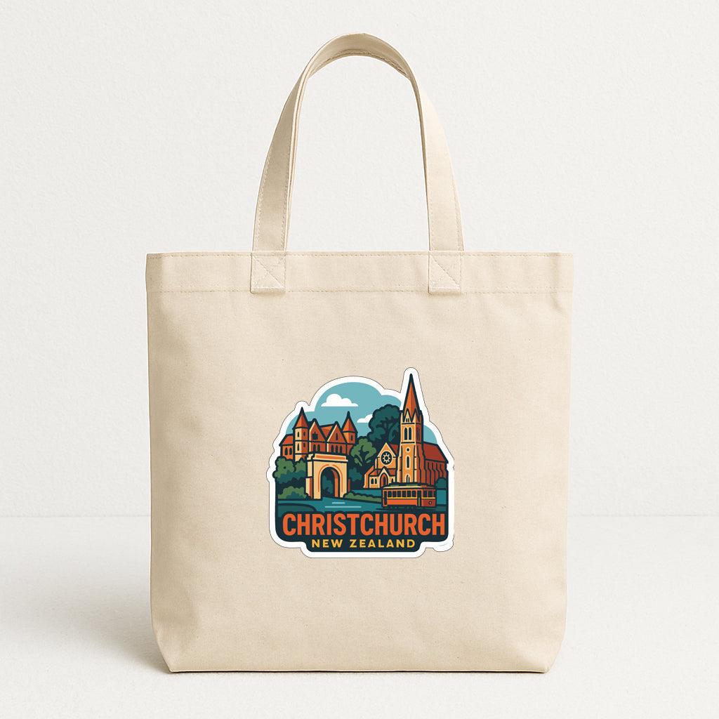 A beige tote bag with a printed design depicting a cityscape and the text "CHRISTCHURCH NEW ZEALAND" printed on it.