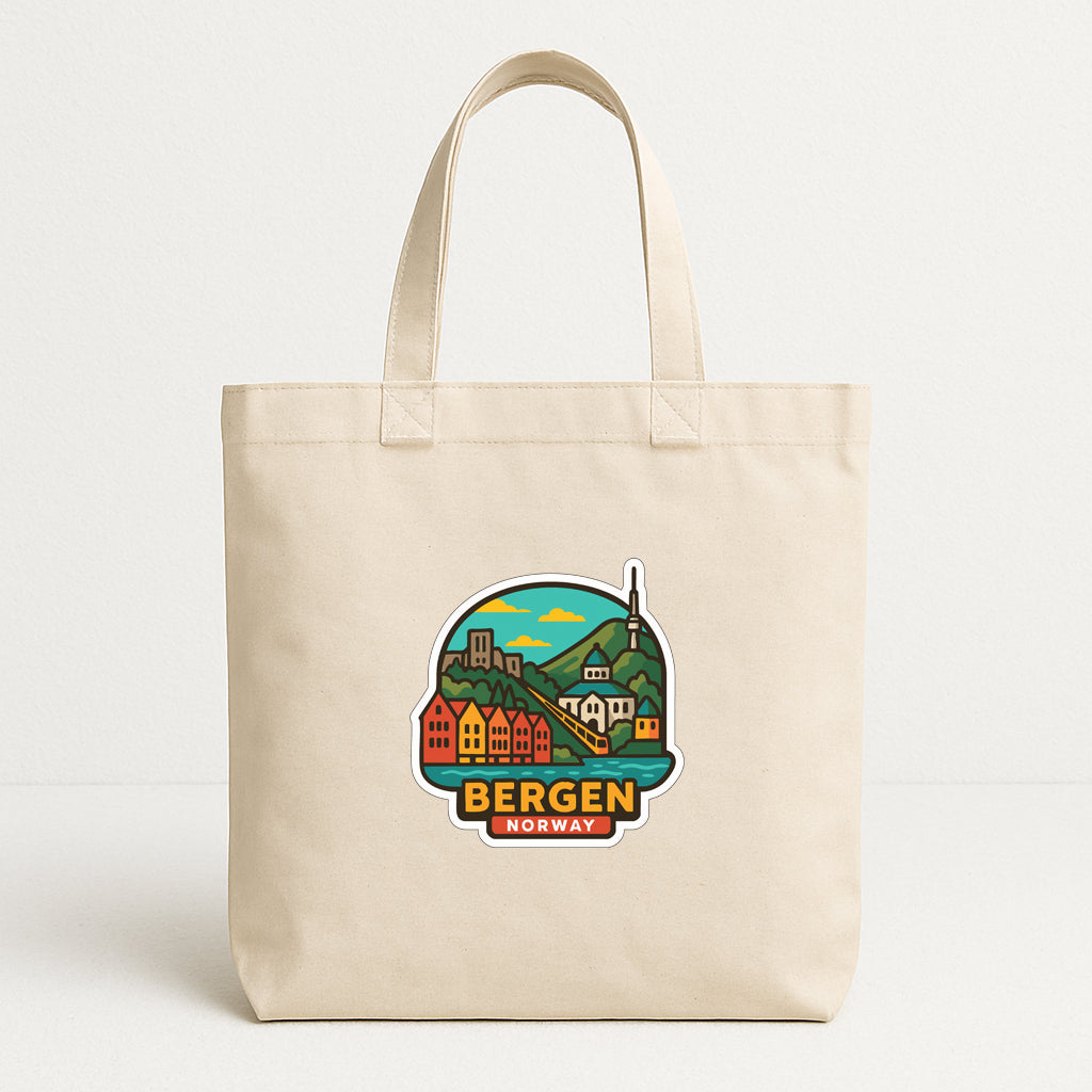 A beige tote bag with a printed design depicting a scenic view of Bergen, Norway.