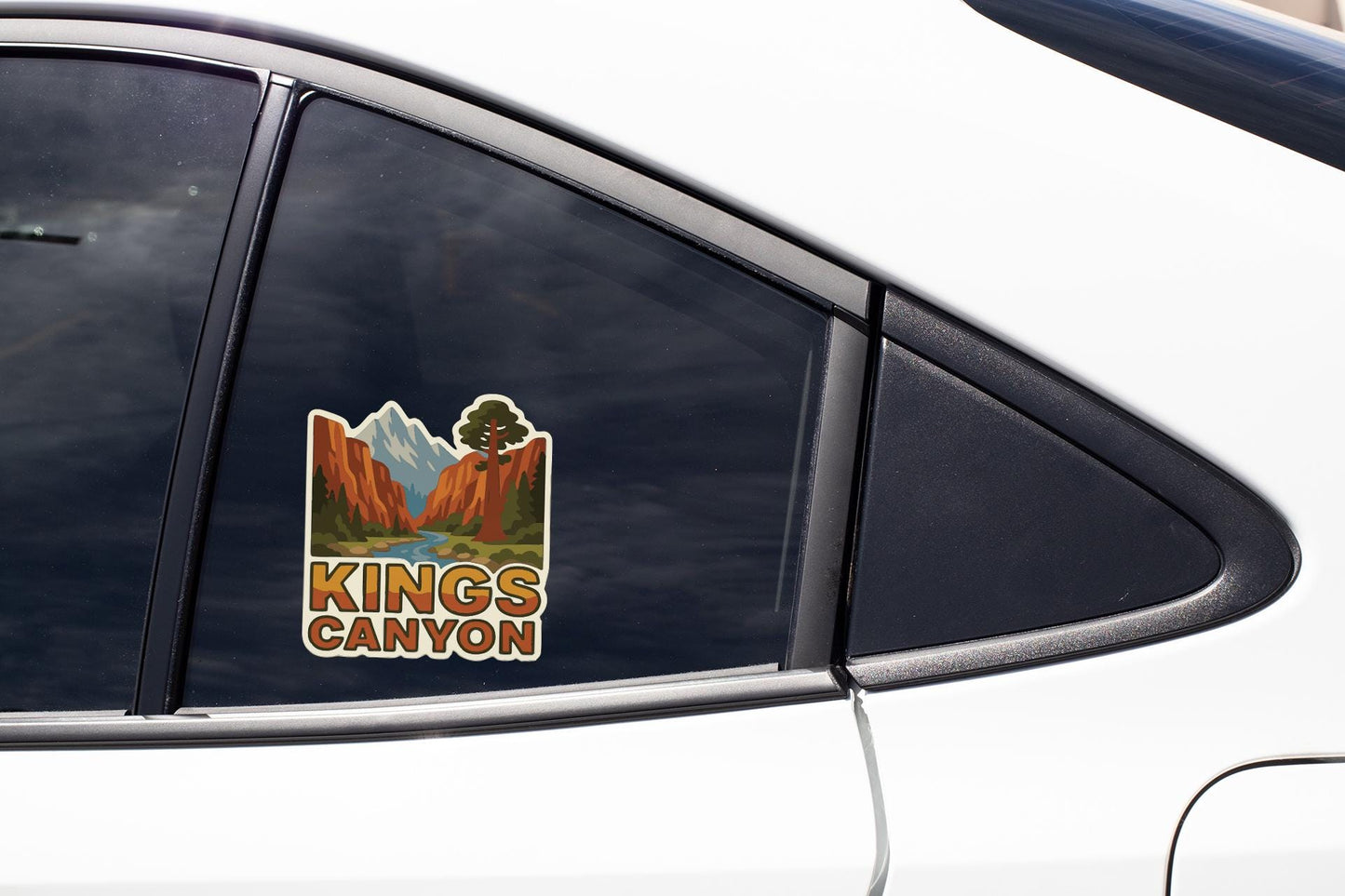 A car window with a sticker that says "KINGS CANYON".