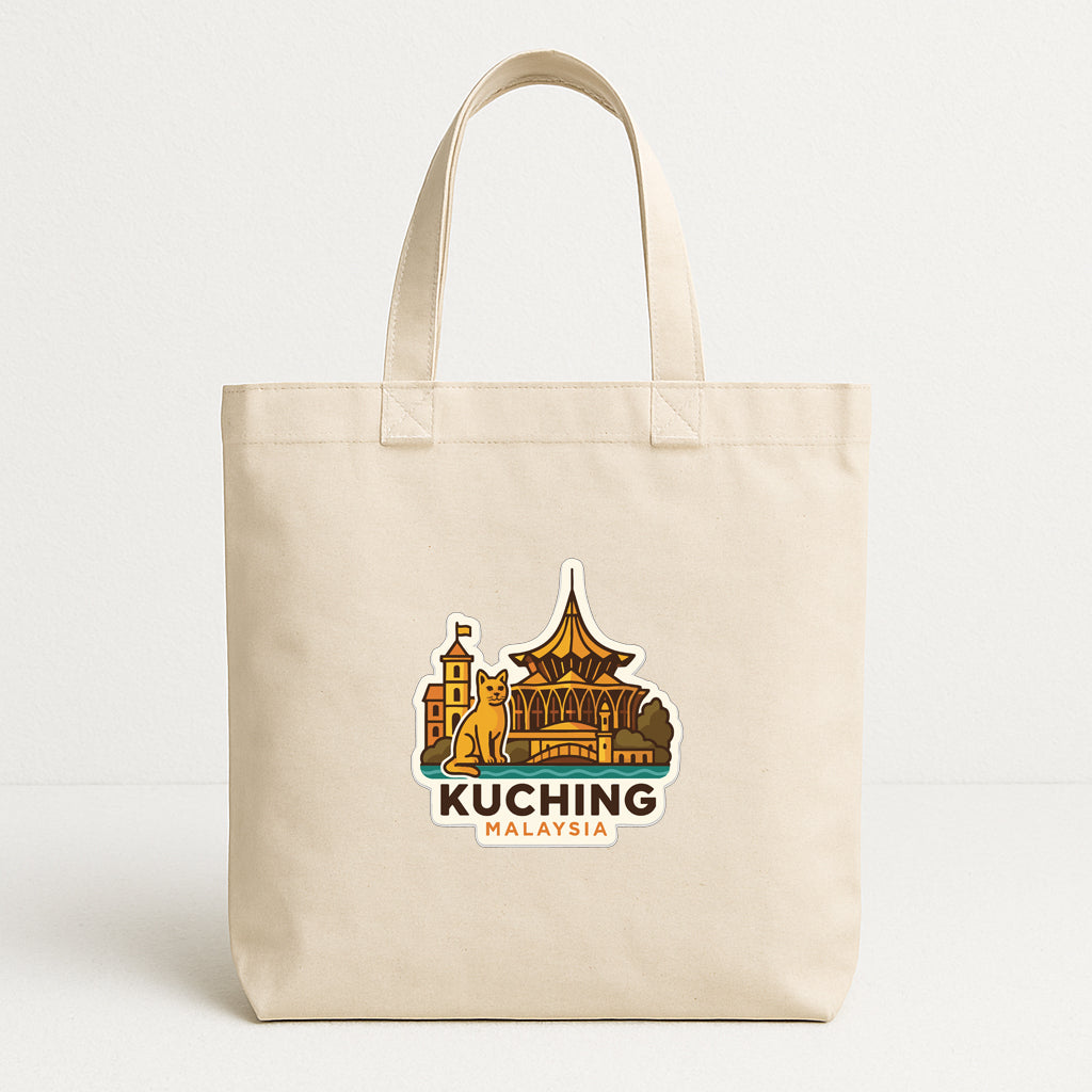 A beige tote bag with a printed design depicting a landmark, specifically the Kuching, Malaysia, building.
