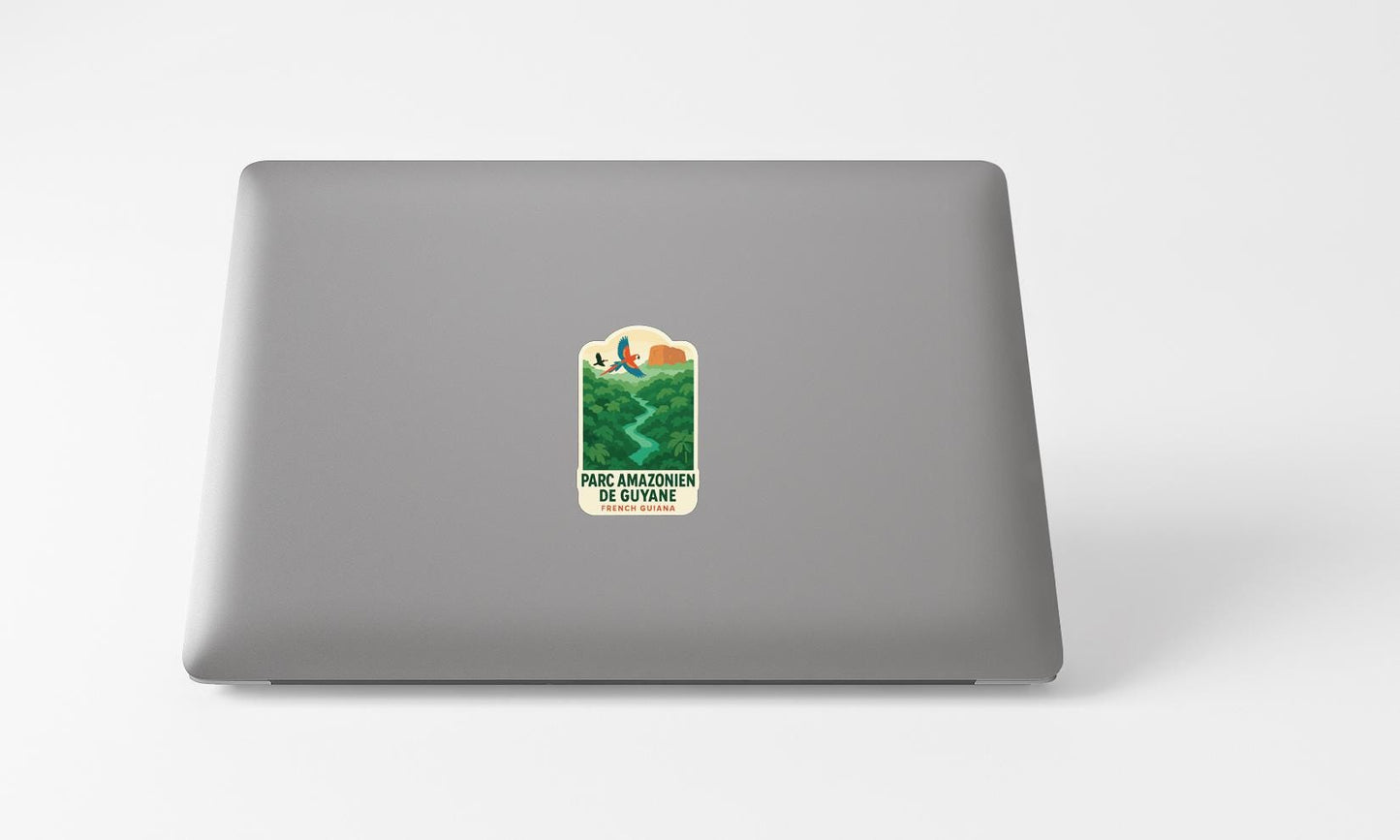 A sticker with a landscape image on a laptop.