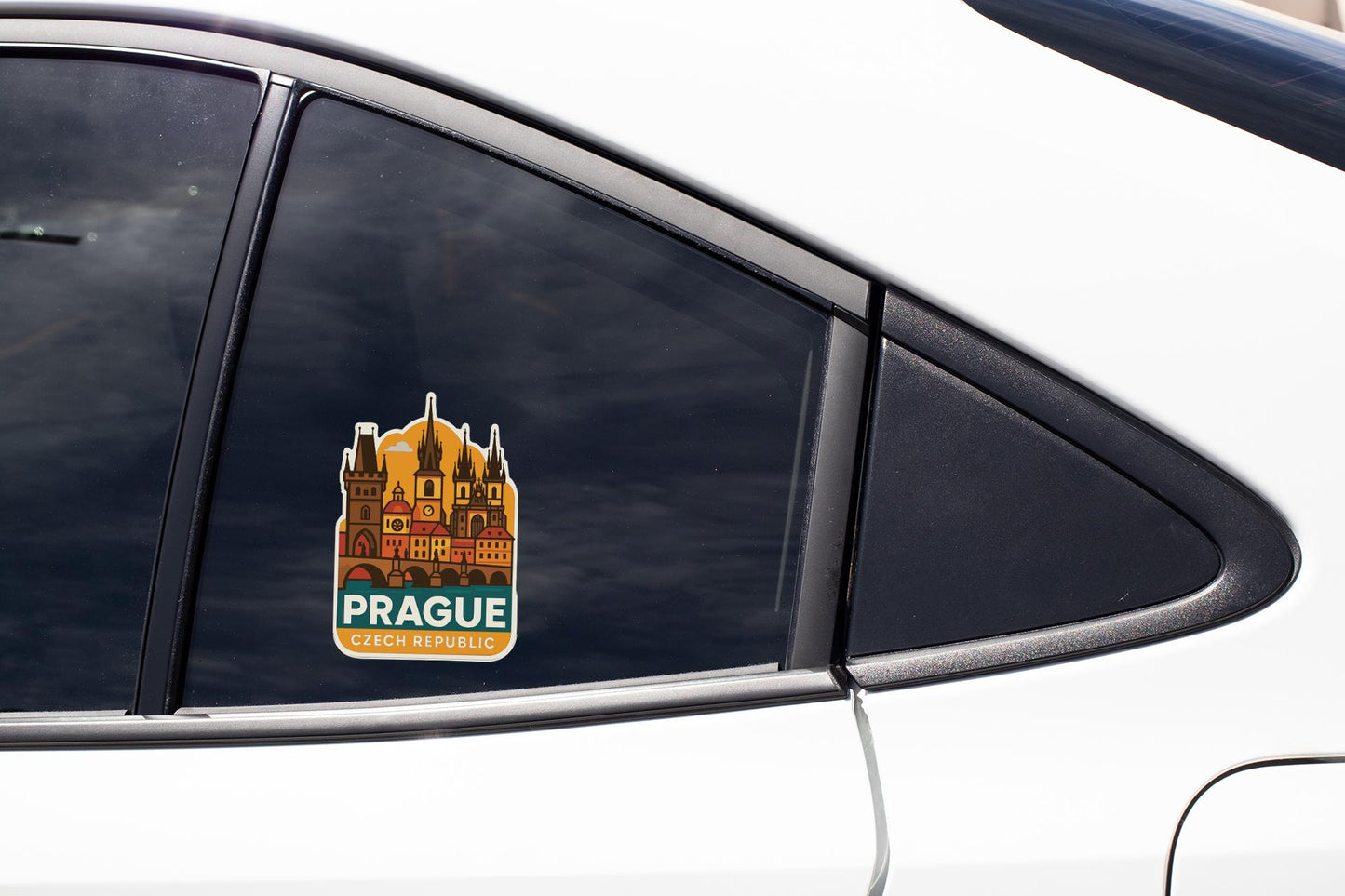 A sticker on the side of a car window, depicting the Prague Castle in the Czech Republic.