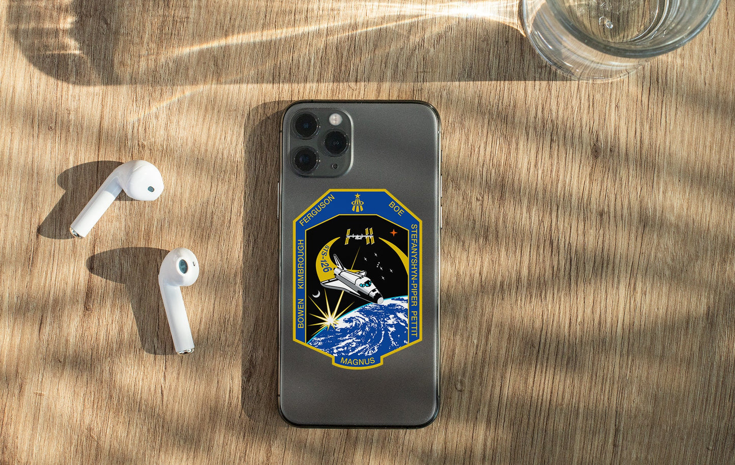 an iphone case with a picture of a space shuttle on it