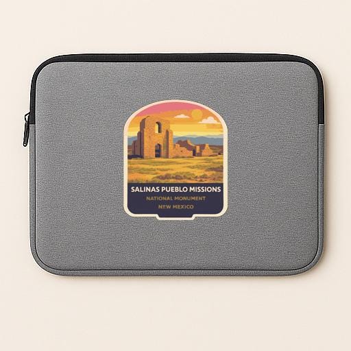 a gray laptop sleeve with a graphic design depicting the Salinas Pueblo National Monument in New Mexico.