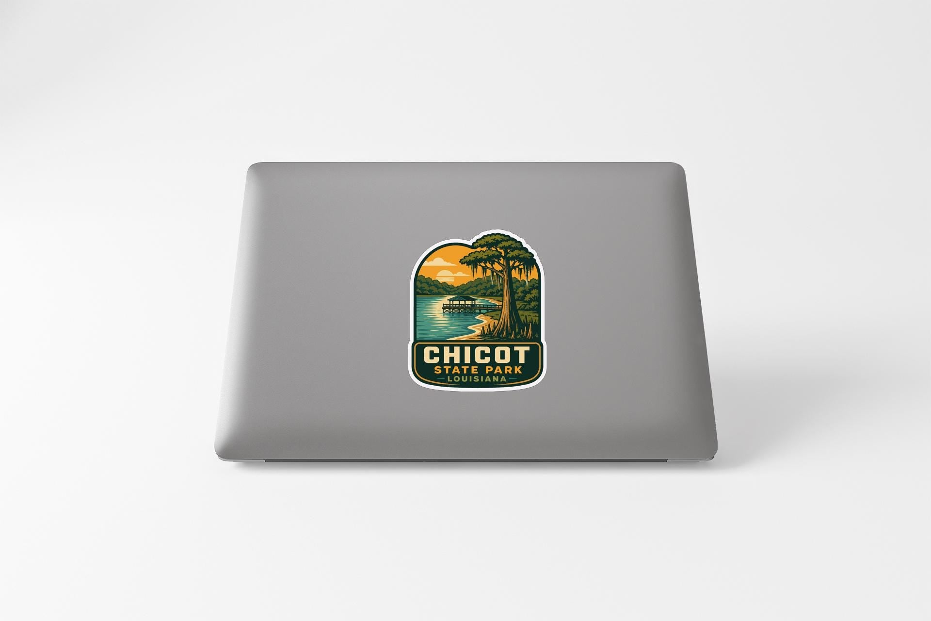 a sticker with a scenic landscape of a lake and trees, along with the text "CHICOT STATE PARK".