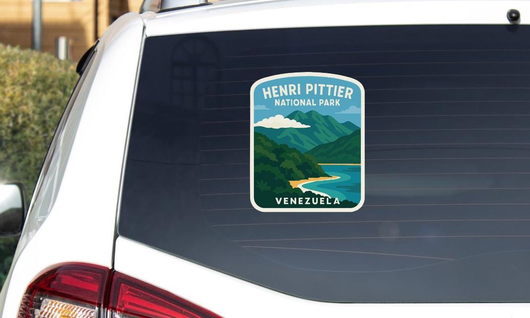 A sticker on the rear window of a car that says "HENRI PITTERER NATIONAL PARK VENEZUELA".