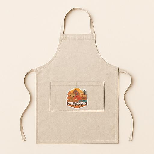 A beige apricot with a graphic of a park on it, featuring the text "Overland Park" on the front pocket.