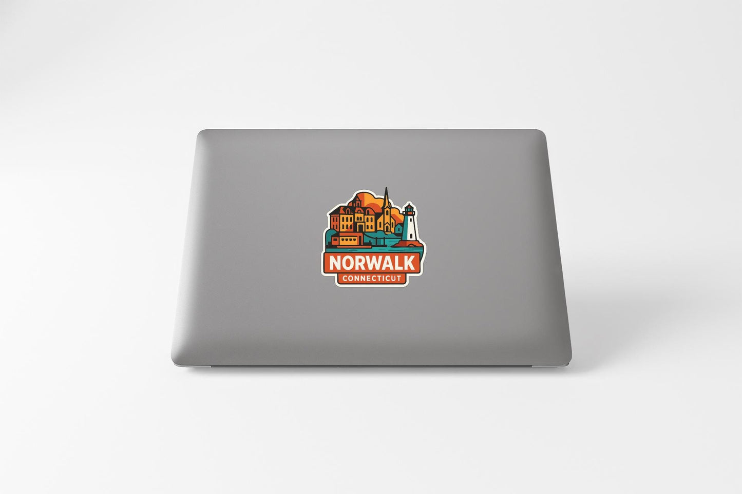 a sticker on the back of a laptop that says "NORWALK CONNECTICUT".