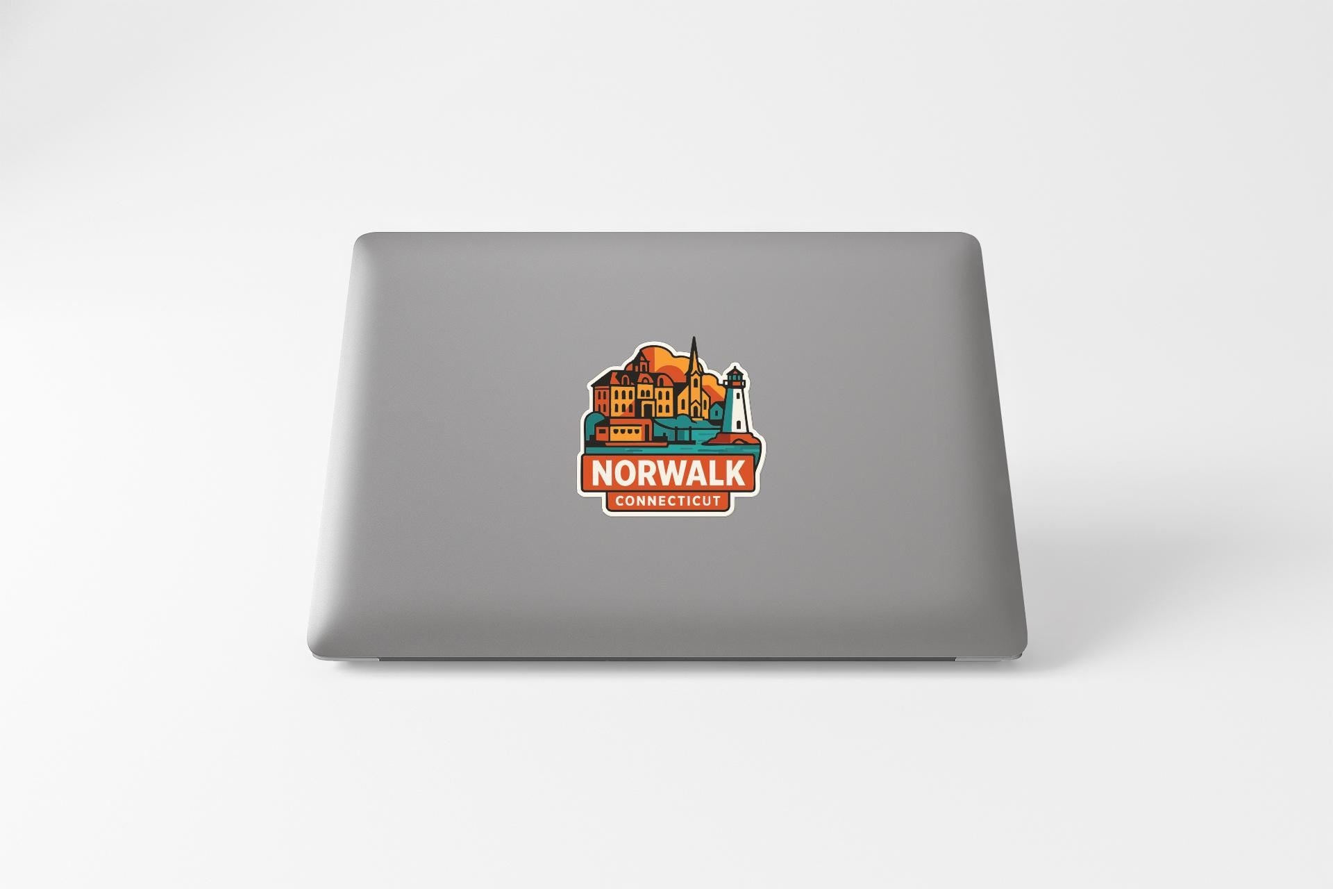 a sticker on the back of a laptop that says "NORWALK CONNECTICUT".