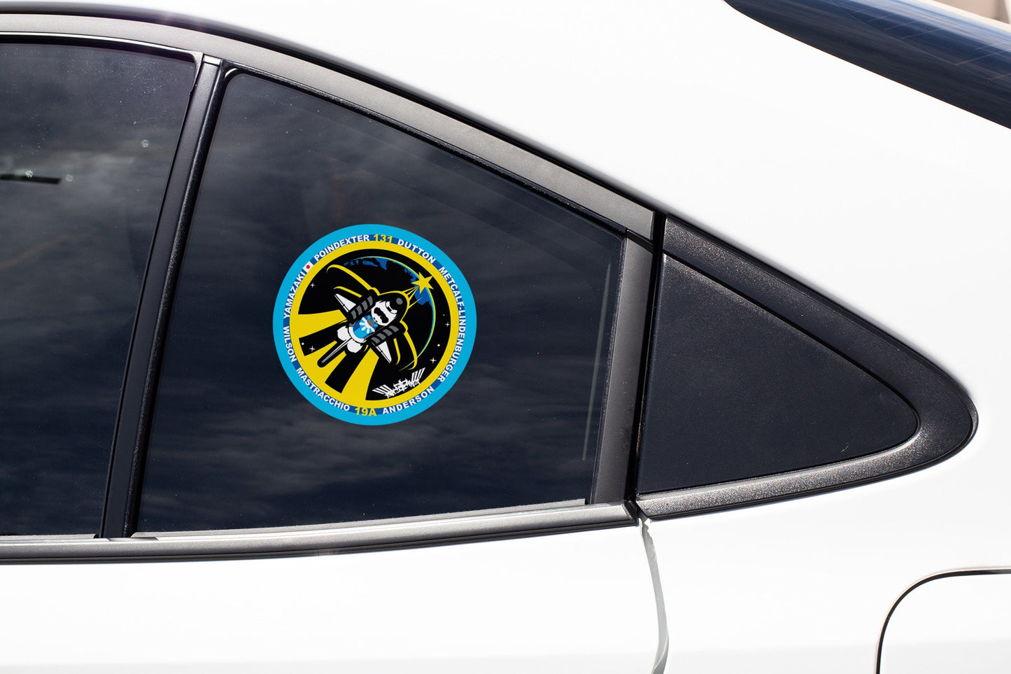 a close up of a car window with a sticker on it