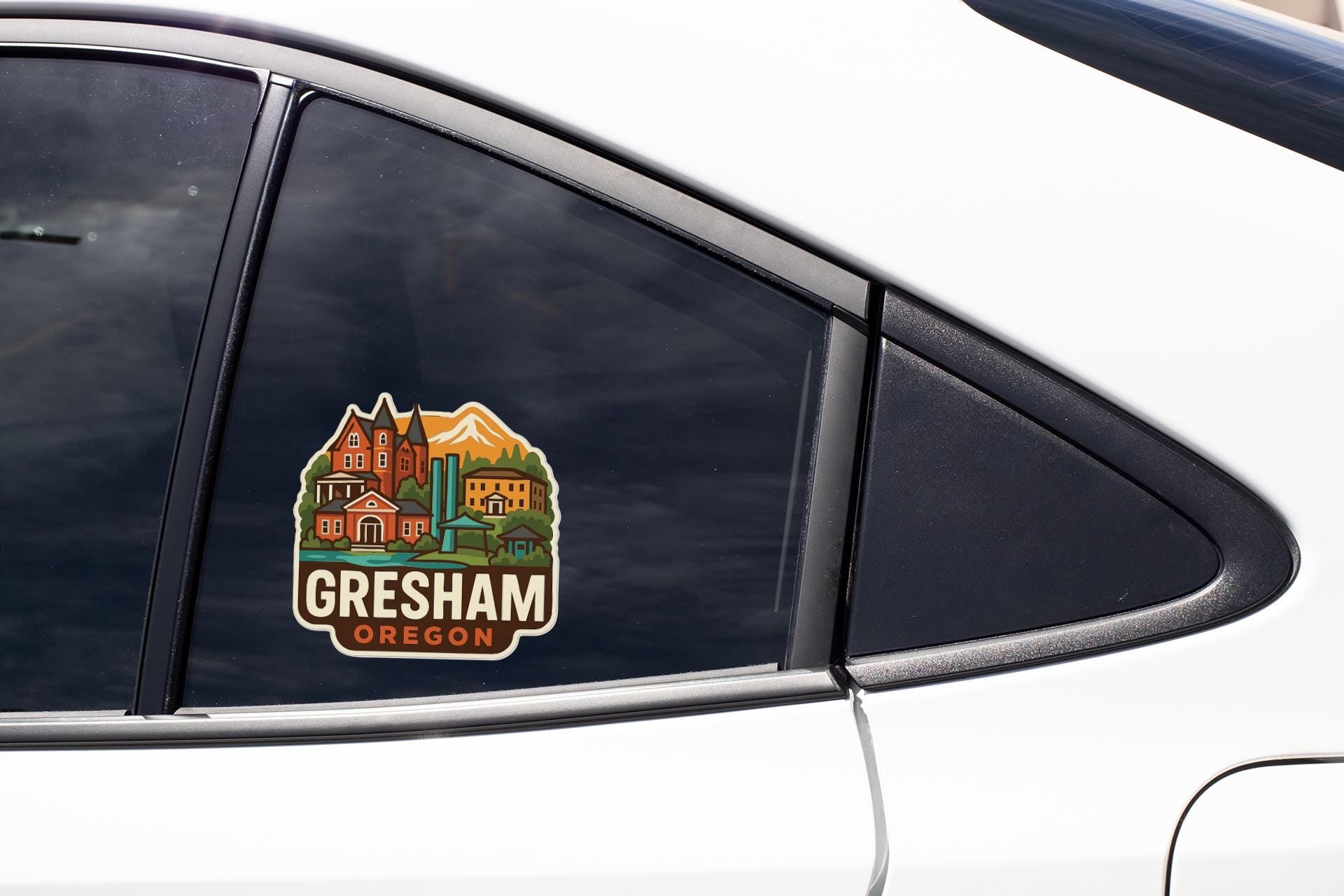 A sticker on the side of a car window that says "Gresham, Oregon".