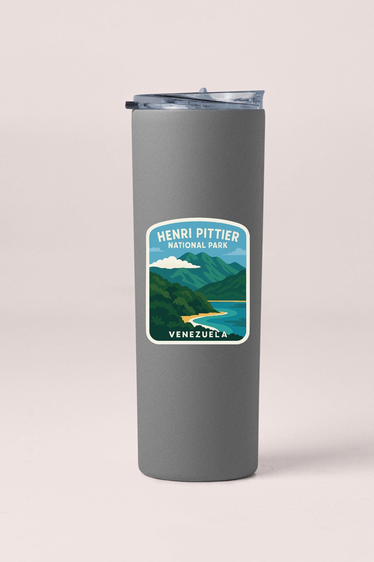 A gray insulated tumbler with a label that says "HENRI PITTER NATIONAL PARK VENEZUELA".