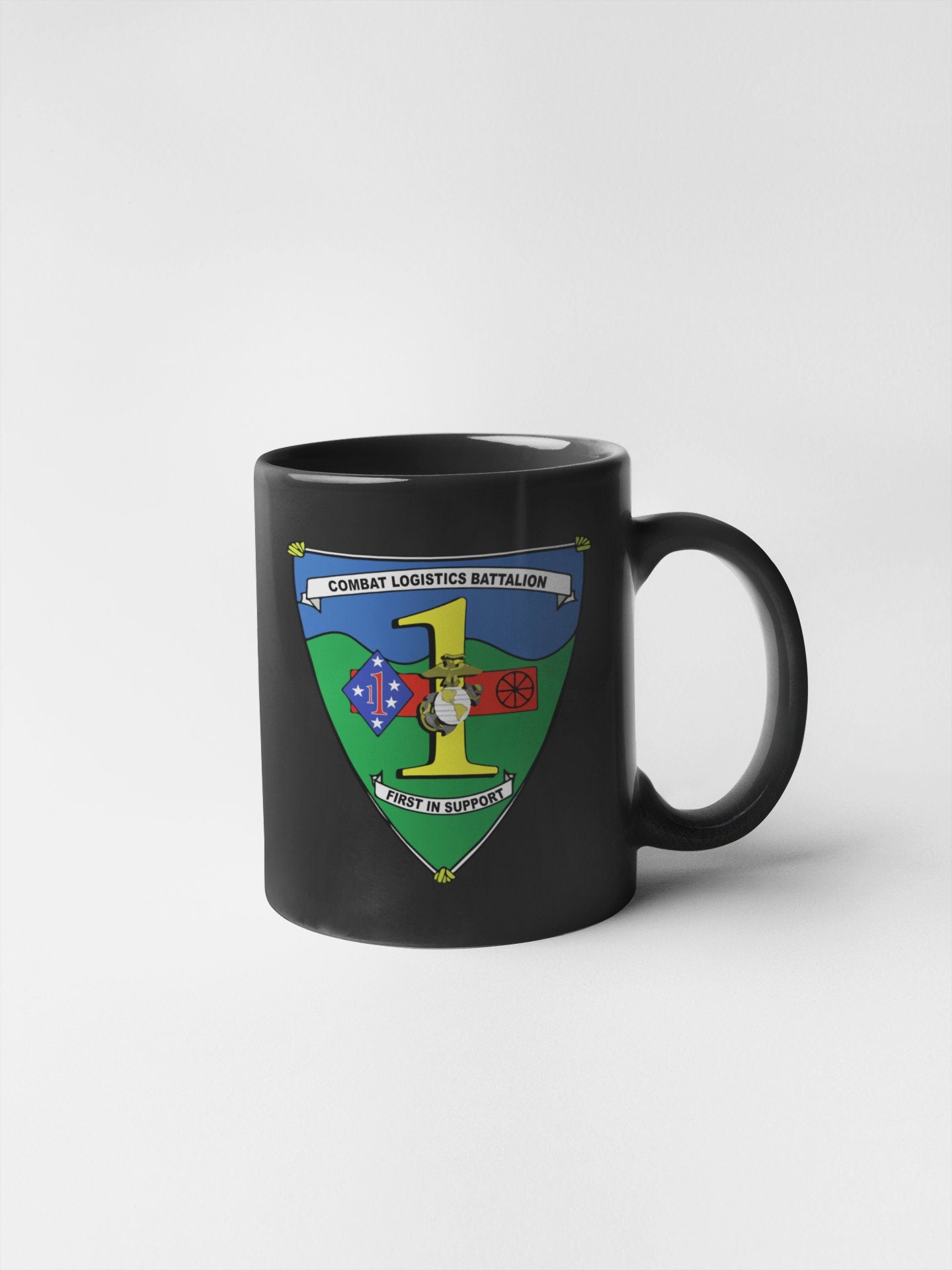 a black coffee mug with a coat of arms on it