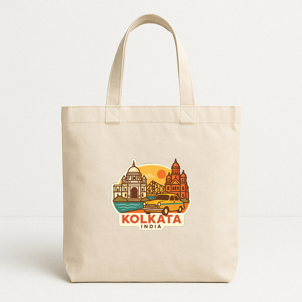 A beige tote bag with a printed design depicting landmarks and a car, along with the text "KOLKATA INDIA".
