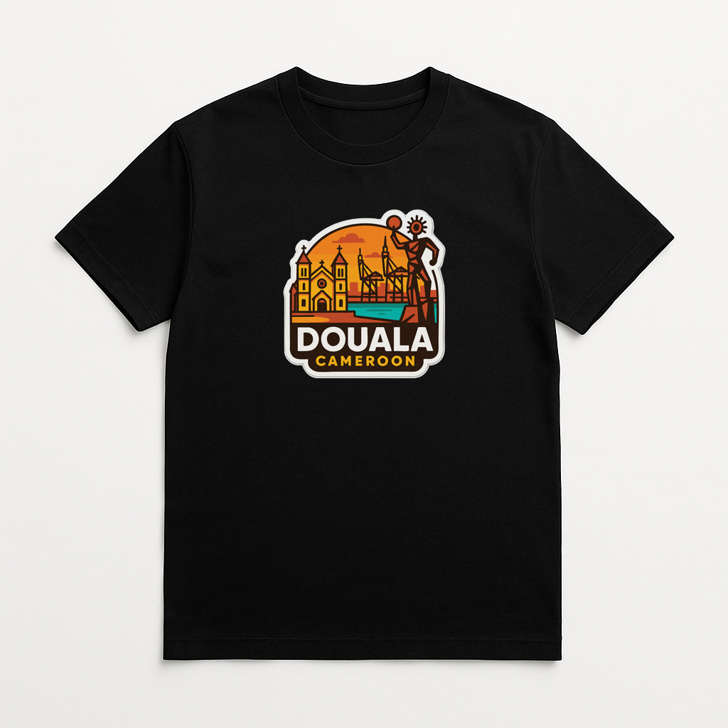 A black t-shirt with a graphic design depicting a cityscape and a figure, along with the text "DOUALA CAMERON".