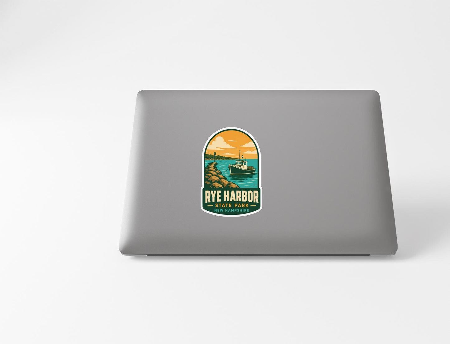a sticker with a scenic illustration of a boat on the water, along with the text "RYE HARBOR STATE PARK" printed on it.