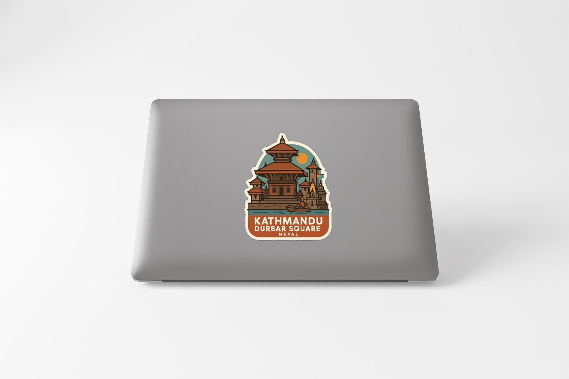 A sticker depicting a temple or pagoda with the text "KATHMANDU DURBAR SQUARE" printed on it.