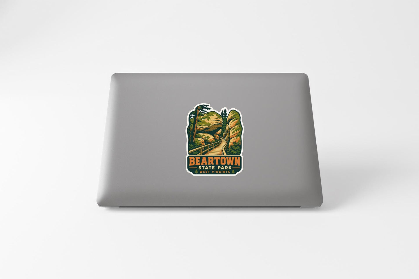 a sticker with a scenic landscape of a mountain and a road, along with the text "BEARTOWN STATE PARK" printed on it.