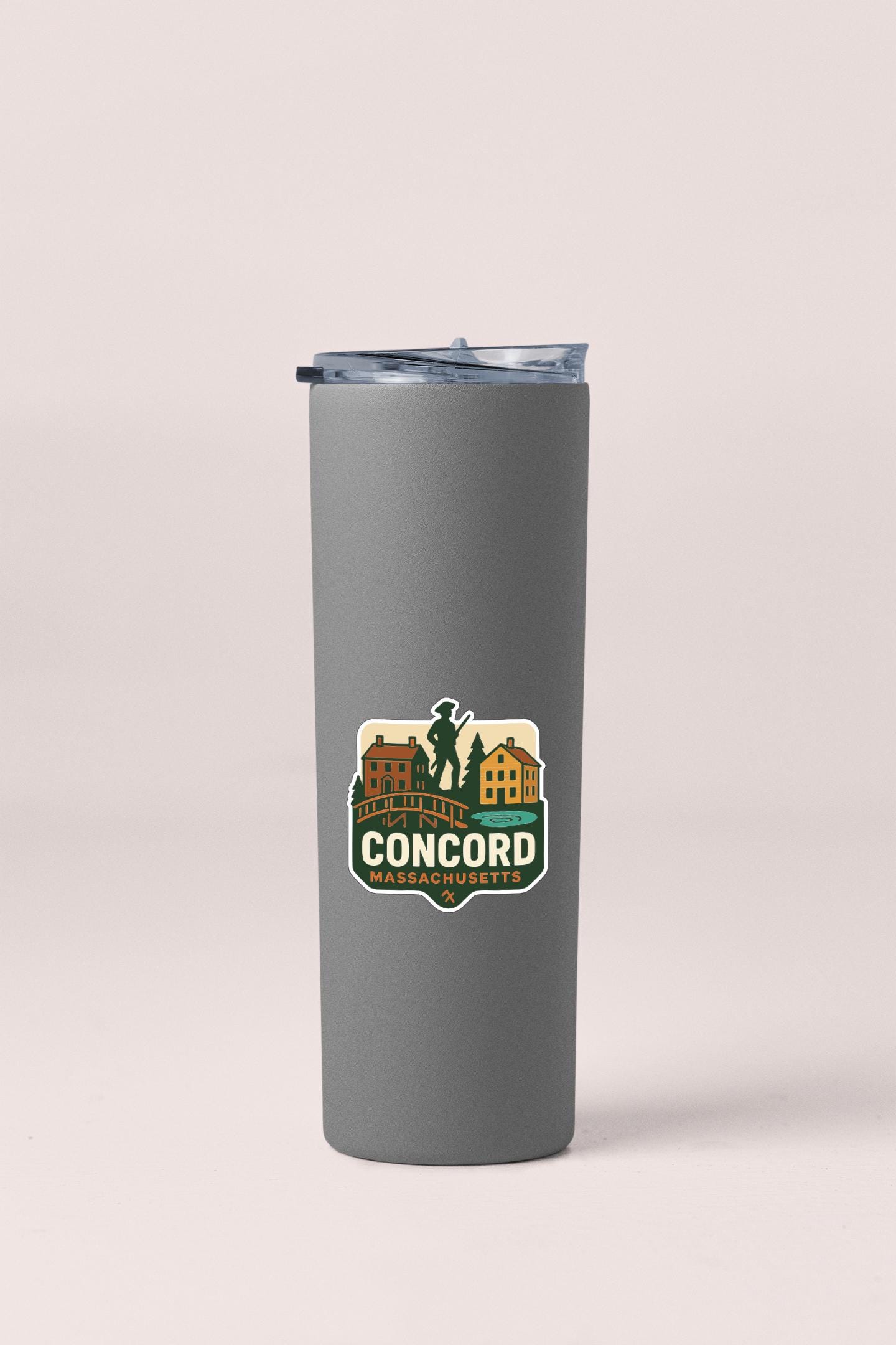 A gray insulated tumbler with a logo on it.