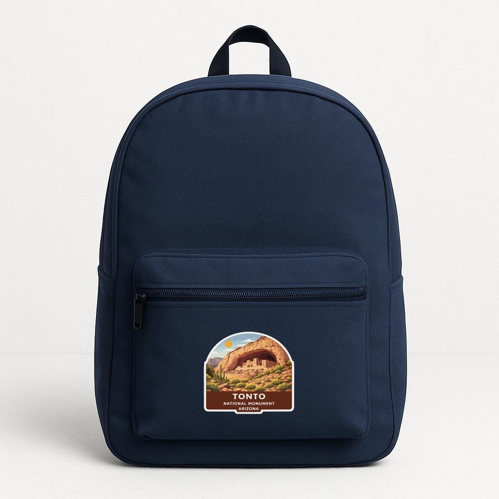 A navy blue backpack with a label that says "Tonto National Park, Arizona" on the front pocket.