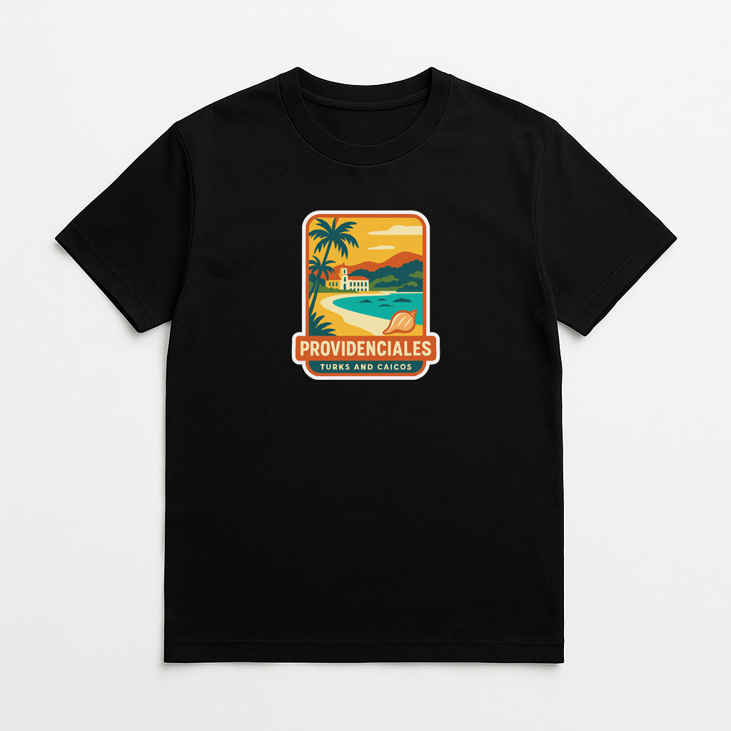 A black t-shirt with a colorful graphic design depicting a tropical beach scene with palm trees, a sunset, and a small building.
