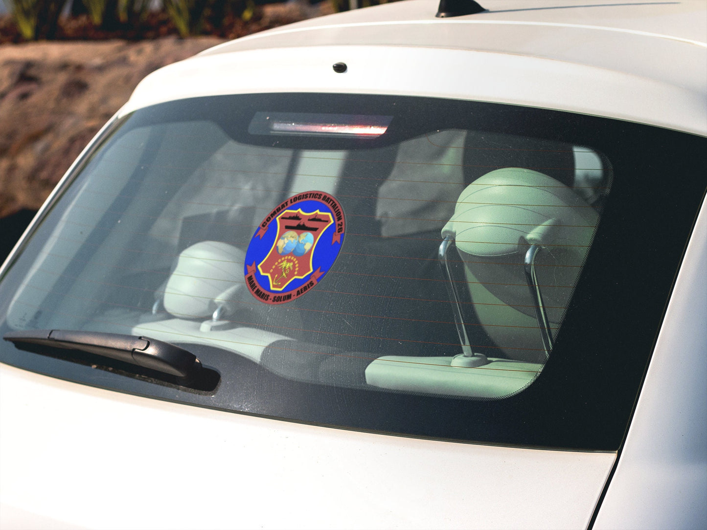a car with a sticker on the front of it