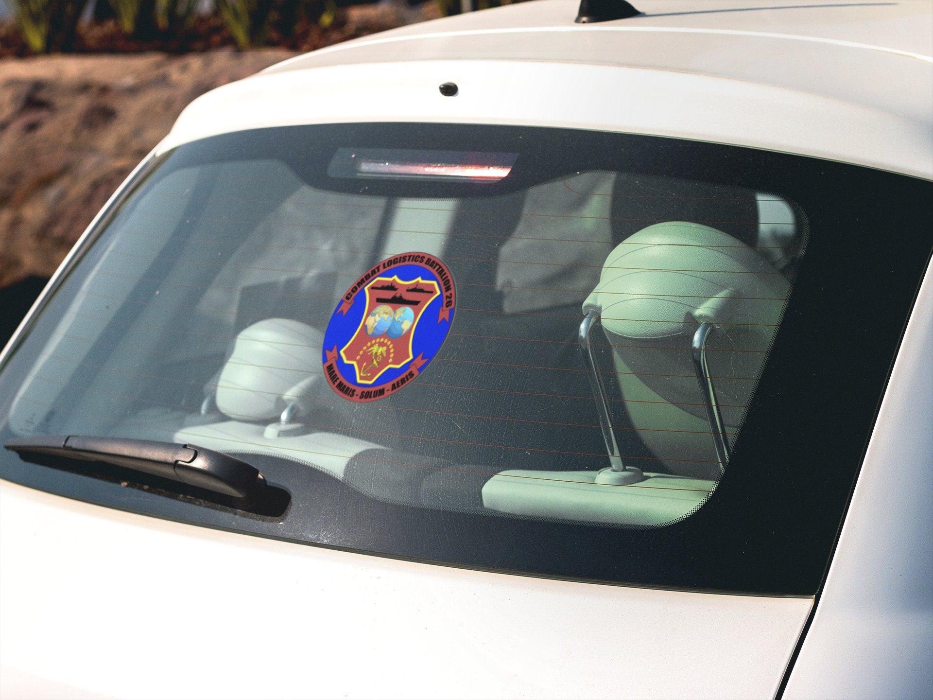 a car with a sticker on the front of it