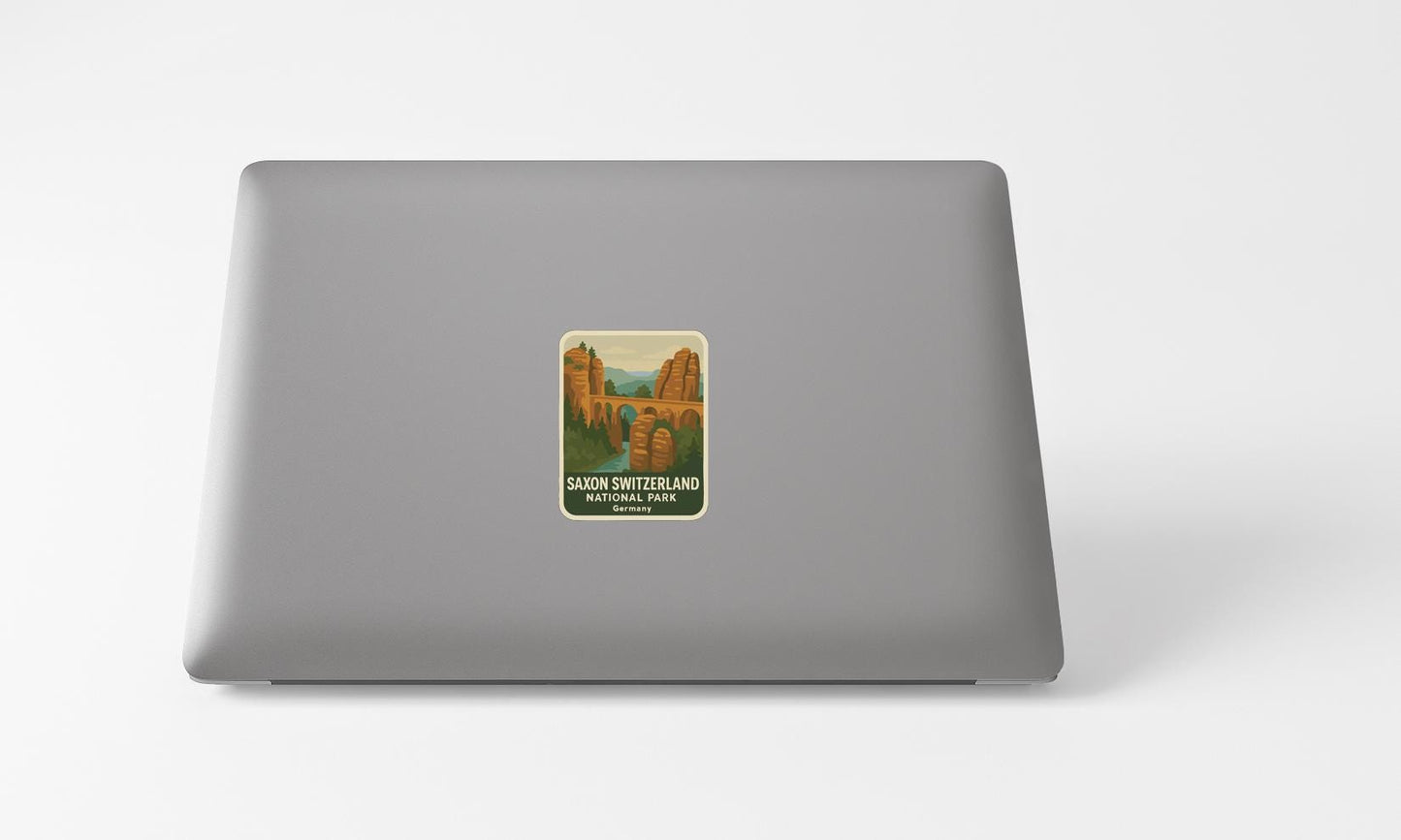 A sticker depicting the scenic landscape of the Swiss Alps, specifically the Sabon Swissland National Park.
