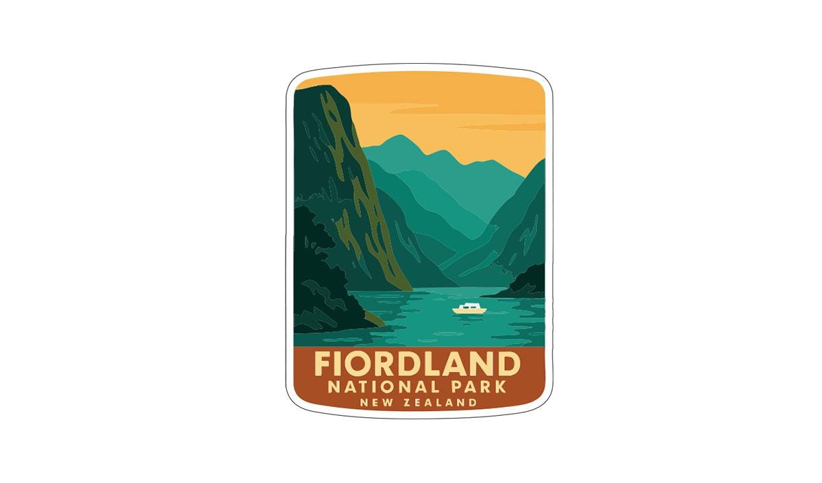 a sticker or label with a scenic mountain landscape and a boat on a lake, representing the Fiordland National Park in New Zealand.