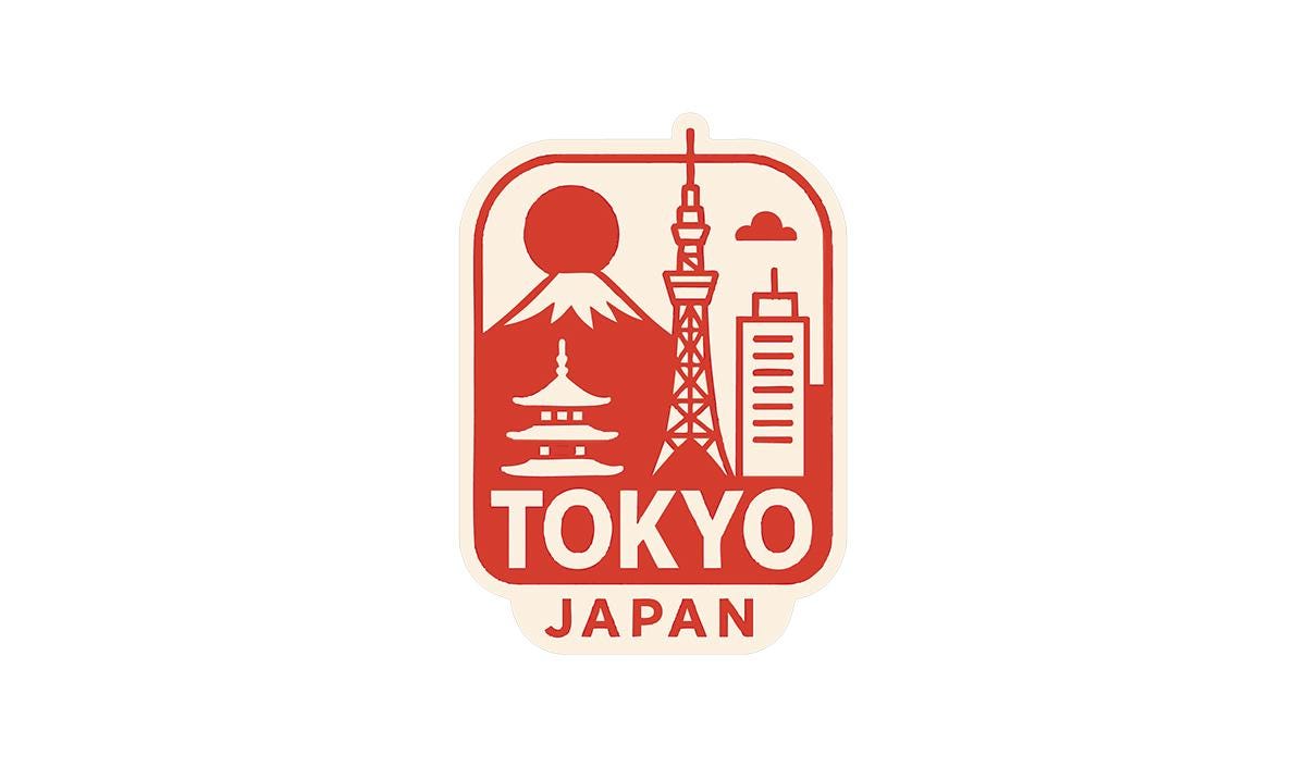a red and white sticker with a picture of tokyo