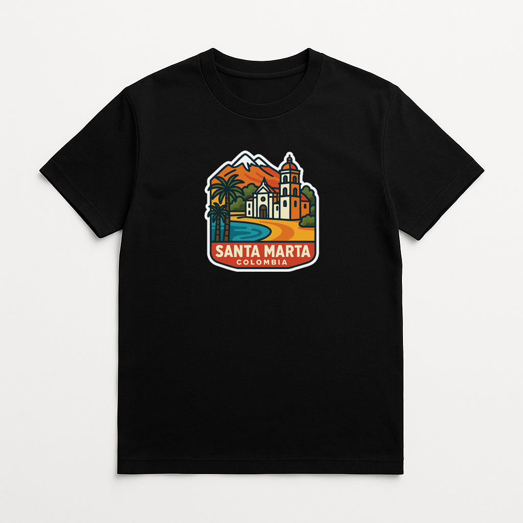 A black t-shirt with a colorful graphic design depicting a tropical landscape with palm trees, mountains, and a building.