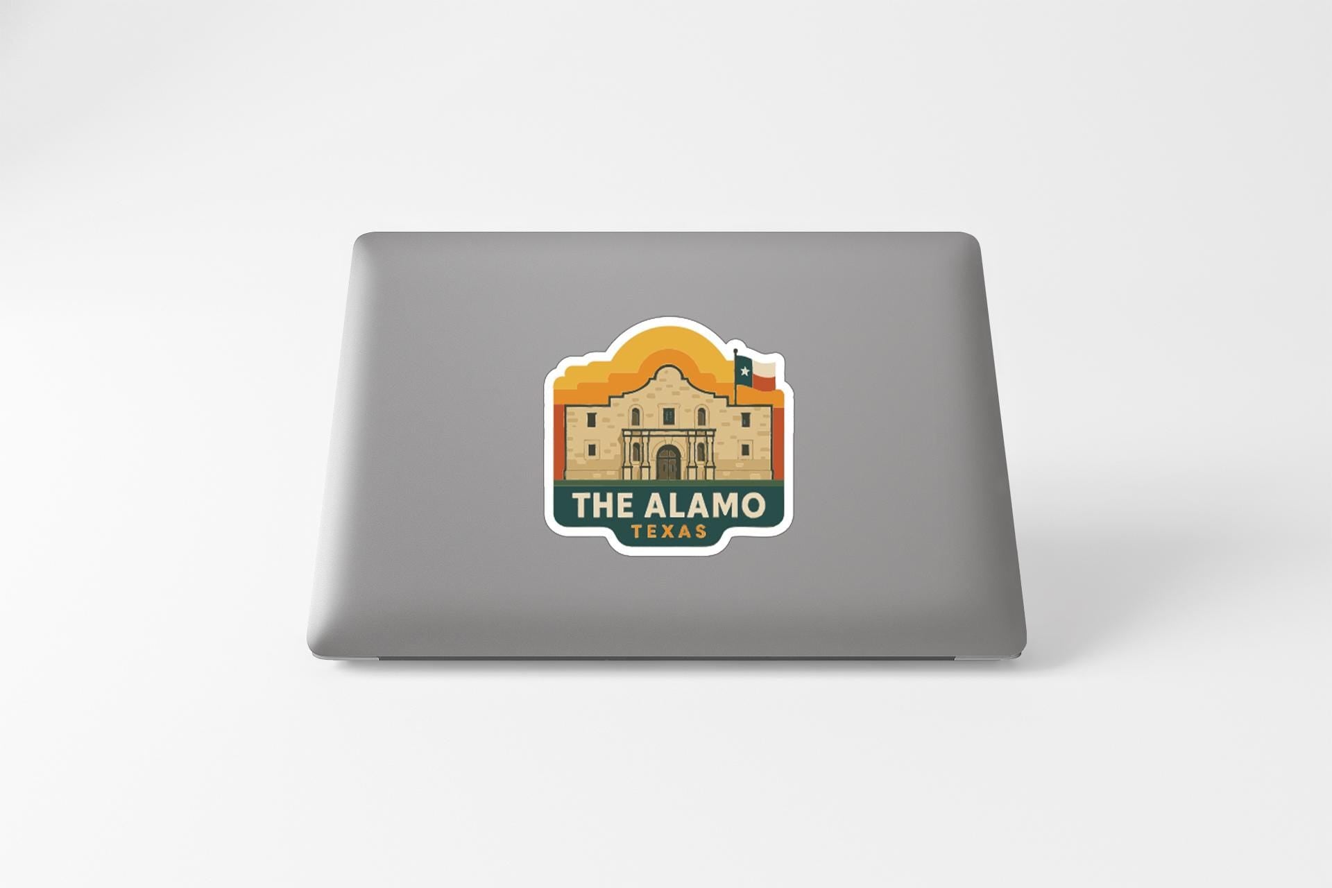 a sticker of the Alamo, a famous landmark in Texas.