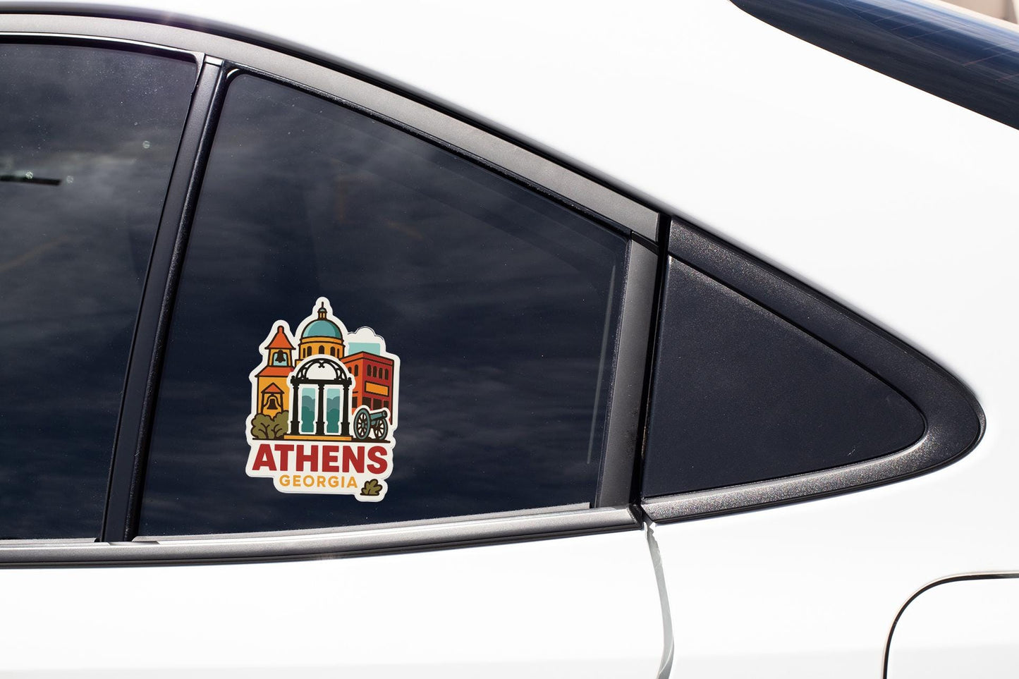 A sticker on the side of a car window, depicting a cityscape with a dome-shaped building and the text "Athens, Georgia".