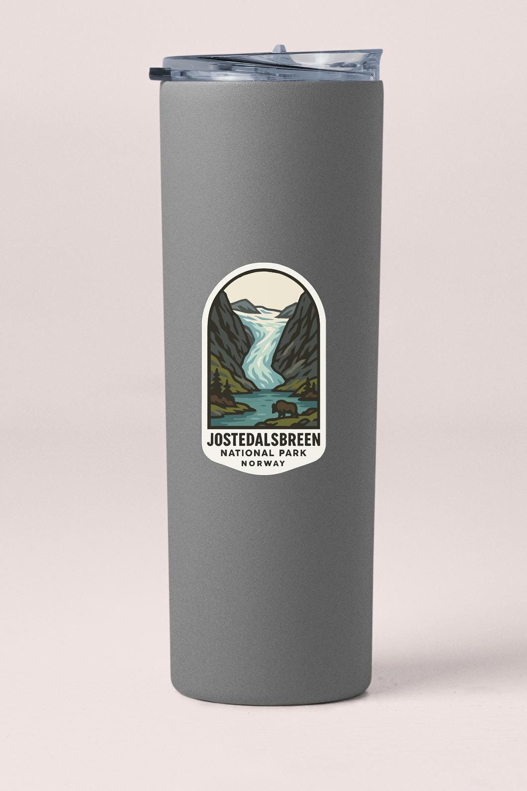 A gray cylindrical container with a lid and a label that reads "Jostedalsbreen National Park Norway".
