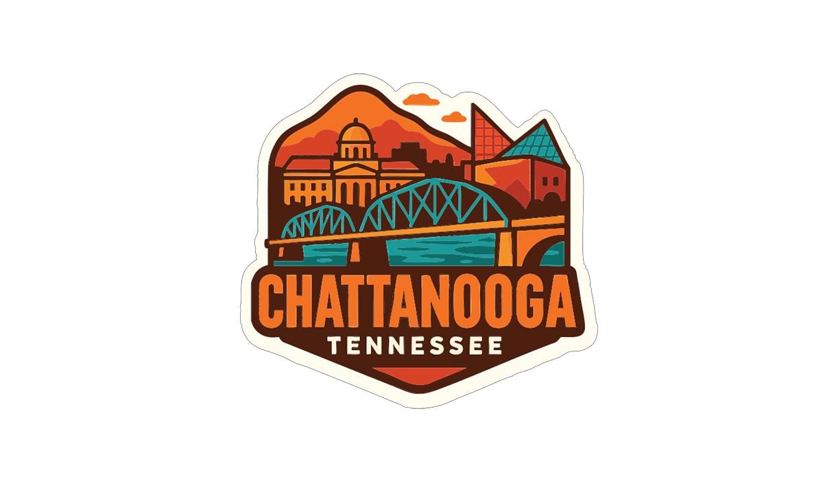 A sticker or emblem featuring the city of Chattanooga, Tennessee, with a bridge, mountains, and other landmarks.