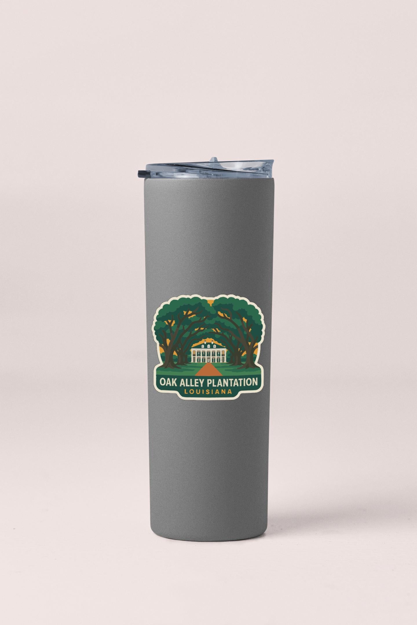 A gray tumbler with a label that says "OAK ALLEY PLANTATION LOUISIANA" on it.