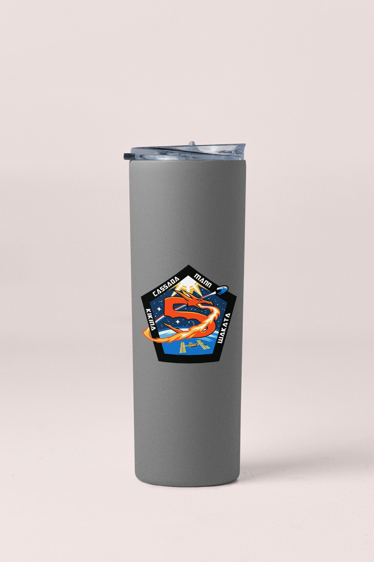 a stainless steel tumbler with a picture of a fish on it