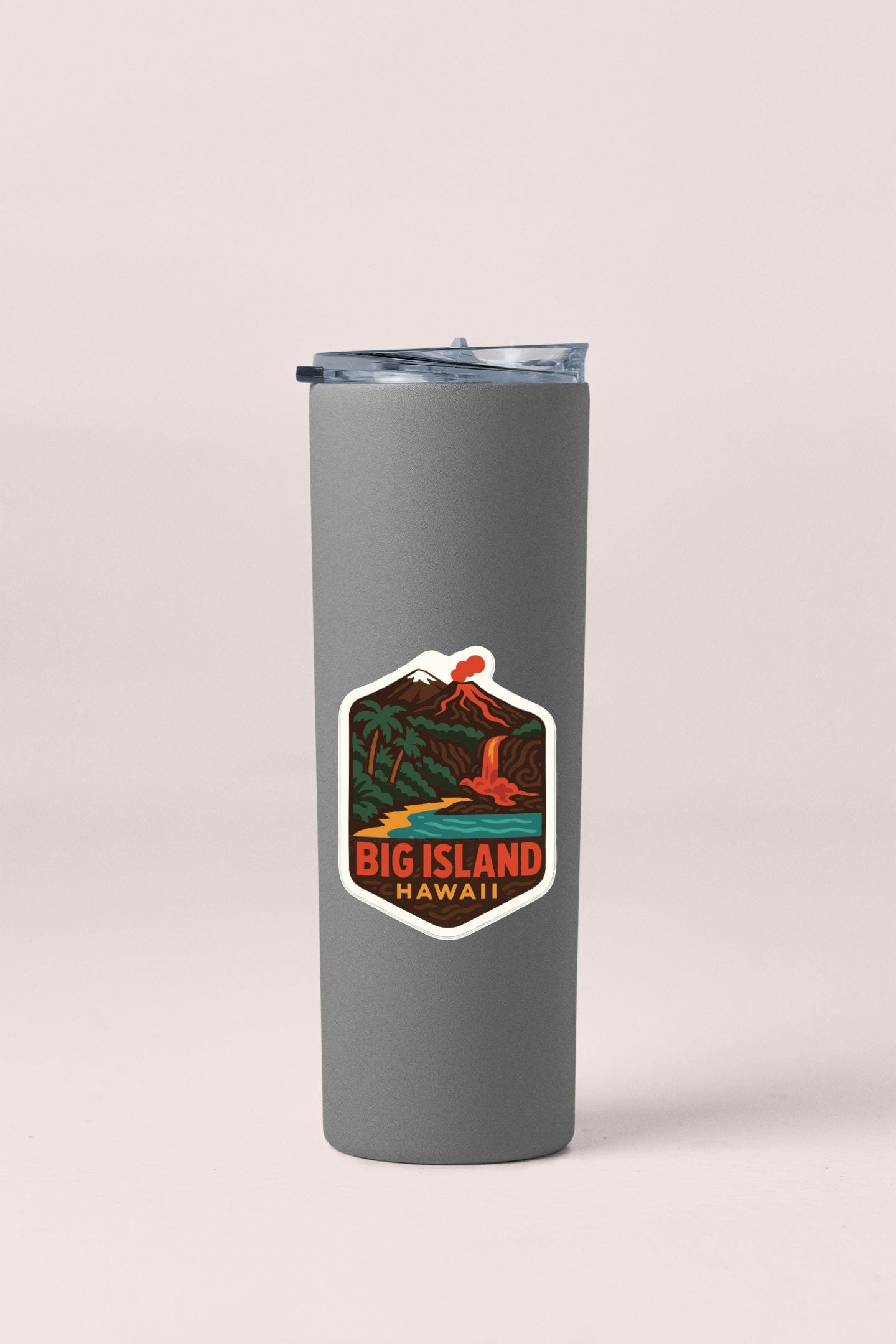 A gray insulated tumbler with a sticker depicting a tropical island landscape and the text "BIG ISLAND HAWAII".