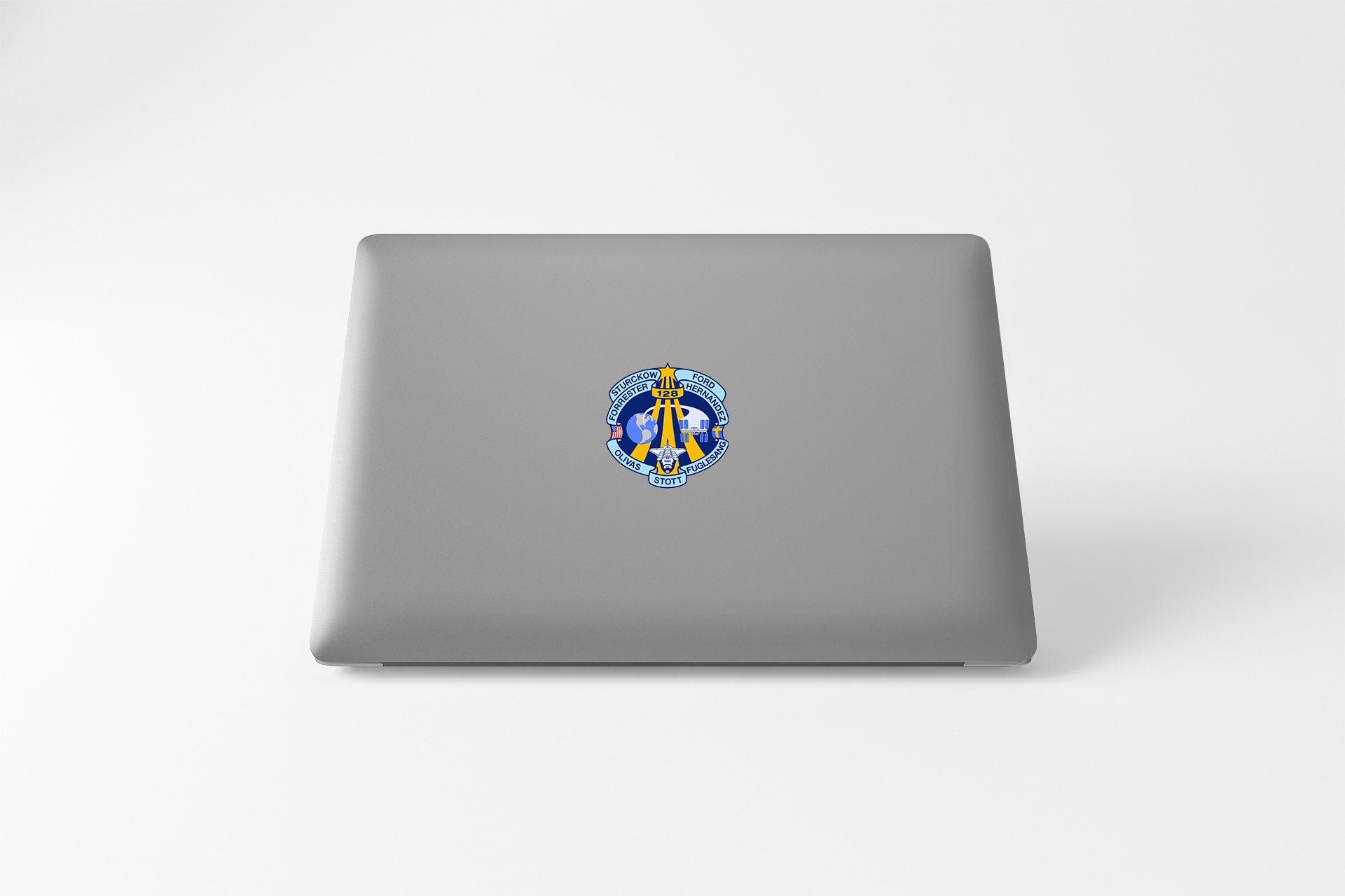 a laptop with a picture of a man on it